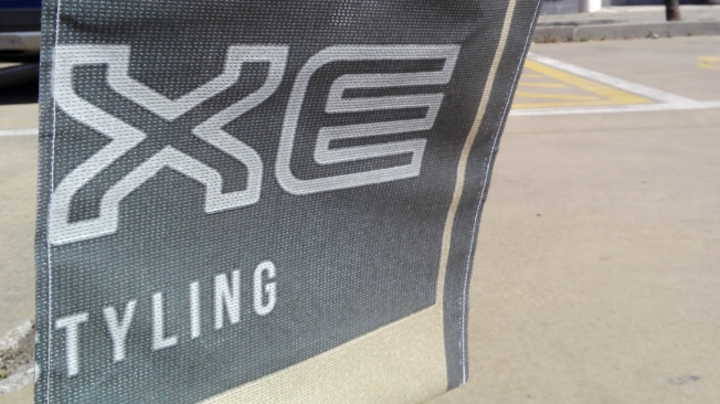Telas publicitárias da AXE transformadas em sacos